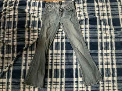 Pantalones de mezclilla Amathyst para mujer 7 azules bootcut pierna desgastados rasgados Foto 1 de 4