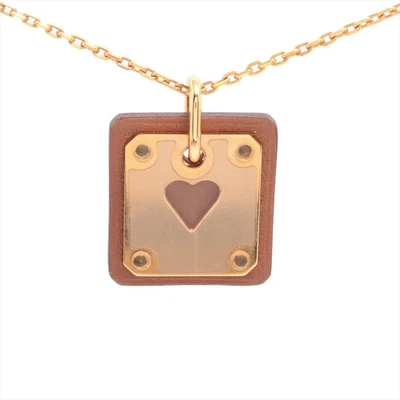 Collar Hermès As de Coeur ACE OF HEART Z:2021 GP y cuero dorado x marrón Foto 1 de 4