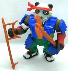 Figura de acción Playmates MOTU 1990 Panda Kuhn Collector - Imagen 1 de 2
