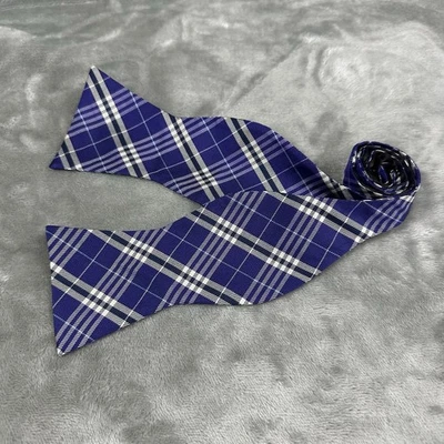 "Pajarita de seda Tommy Hilfiger para hombre púrpura azul patrón a cuadros 2,75"" de ancho autocorbata" Foto 1 de 4