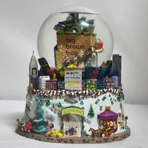 Bloomingdales: Globo de Nieve Musical Árbol Brillo Bolso Marrón Grande - Imagen 1 de 5