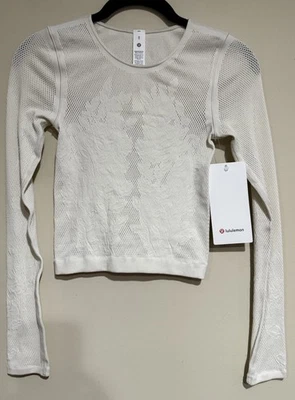 NUEVO CON ETIQUETAS Camisa Lululemon Talla XS (2/4) Reveal Tejida Floral Manga Larga LTIV Marfil Foto 1 de 4