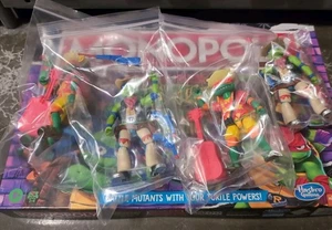 TMNT Lot of 4 2022–2025 Ninja Turtles And A New Unopened TMNT Monopoly Game D - Picture 1 of 2