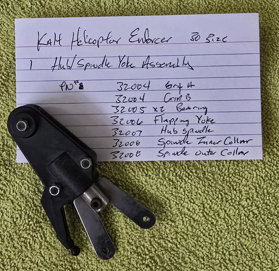 VINTAGE Kalt Baron/Enforcer 30 Helicopter PARTS - Hub/Spindle Yoke Assy - Grips - Image 1 of 1