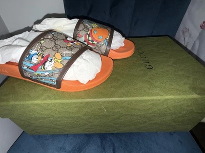 Gucci GG Mujer’s x Disney Pursuit Donald Duck Slides Sandalias Zapatillas Talla 38 Foto 1 de 4