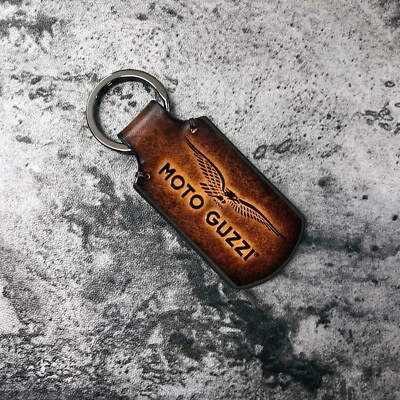 Handmade leather keychain with Moto Guzzi Logo in Brown. 1EA - Image 1 of 4