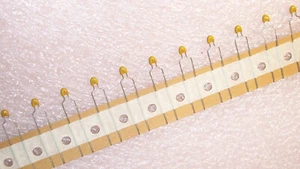 QTY (100) .1uf 50V 10% X7R RADIAL CERAMIC MLCC CAPACITORS K104K10X7RF5UH5 VISHAY - Picture 1 of 2