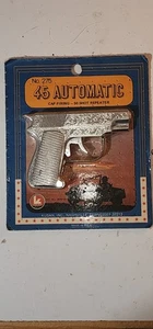  45 Auto, #275 is a vintage toy made in the USA. Cap firing, 50 shot reapeter.  - Picture 1 of 2