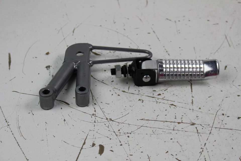 UNITED MOTORS SMF DTF DSF 200 ESTRIBA TRASERA IZQUIERDA JUEGO TRASERO MONTAJE SOPORTE MONTAJE  Foto 1 de 1