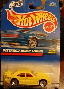 Hotwheel Error RARE 1998 Peterbilt Dump Truck On Pkg. But Mustang Car Inside - Picture 1 of 2