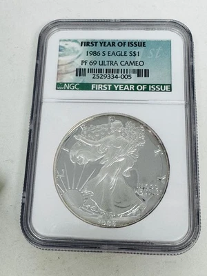 1986  S   PF 69  ULTRA CAMEO  SILVER EAGLE   FIRST YEAR OF ISSUE  Beautiful Coin - Image 1 of 4