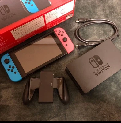Open Box Nintendo Switch Console with Neon Red and Neon Blue Joy-Con in Box - Image 1 of 2