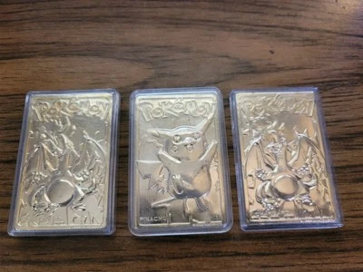 Burger King Pokemon Gold Metal Card, Charizard X2 & Pikachu - Image 1 of 4