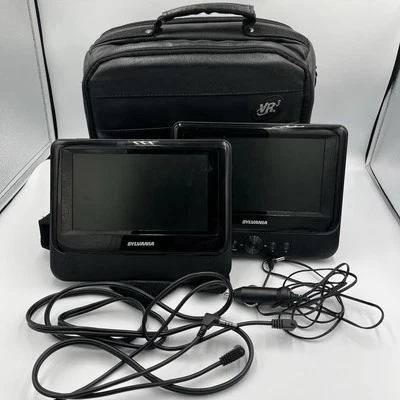SYLVANIA SDVD7750 7" Portable DVD Player - Black, 2 Pack. Main Works 2nd Doesn’t - Image 1 of 4