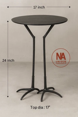Mesa redonda de diseño único moderna con patas de garza antiguas negras para beber animales Foto 1 de 4