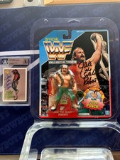 WWF Autographed hasbro Jake the Snake Roberts MOC With Autographed Card