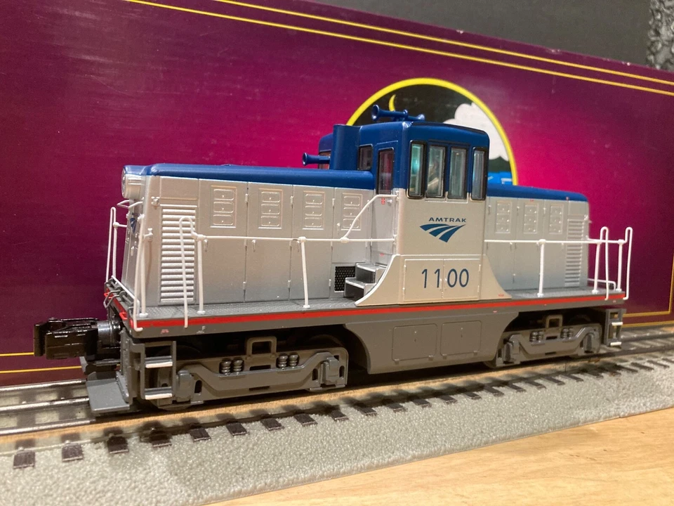 MTH O 20-20775-1 ProtoSound-3.0 Amtrak 44 Ton Phase 1C Diesel Switcher #1100 - Image 1 of 4
