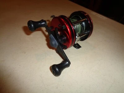 Carrete baitcaster de pesca ABU GARCIA AMBASSADEUR 5000, diestro, con línea trenzada Foto 1 de 4
