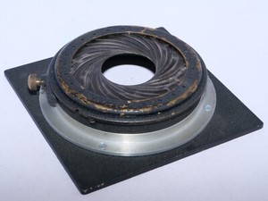 Universal Iris Lens Mounting Clamp. Large 75mm Size Opening. On Sinar Board.