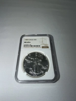 1989 $1 AMERICAN SILVER EAGLE NGC MS69 STAR - Image 1 of 2