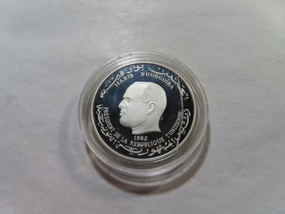 C24 Tunisia 1982 Silver 5 Dinars Int'l Year of the Child 0.8095 Oz. ASW PROOF - Image 1 of 2