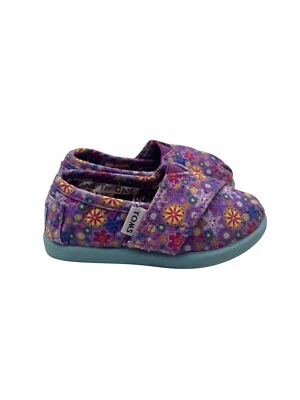Zapato de lona floral sin cordones Toms Disney It’s A Small World bebé talla T5 Foto 1 de 4