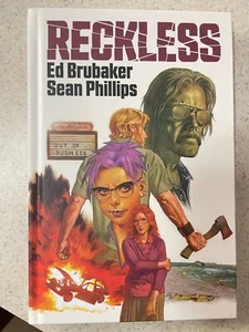 Reckless Hardcover – by Ed Brubaker, Sean Phillips Hardcover HC - Picture 1 of 7