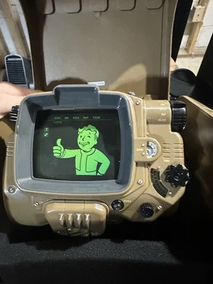 Fallout 4: Pip-Boy Edition Game And Ultimate Vault Dwellers Guide Bundle - Image 1 of 4