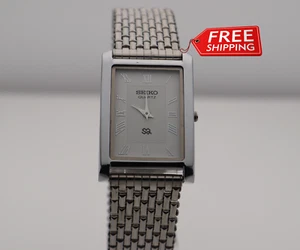 Elegant Seiko Slim White Dial Quartz Watch – Vintage Men’s Wristwear - Bild 1 von 7