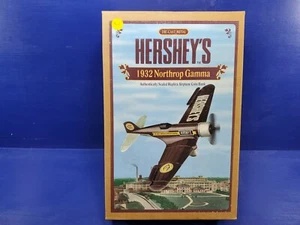 ESZ9718. Hershey's 1932 NORTHROP GAMMA Airplane Diecast Coin Bank Ertl (1995) = - Picture 1 of 3