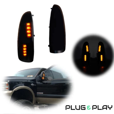 Black/Smoke Amber LED Towing/Side Mirror Signal Light for 99-07 Ford Super Duty - Image 1 of 4