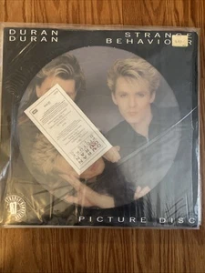 DURAN DURAN STRANGE BEHAVIOR 12 INCH ITALY TOUR SOUVENIR PICTURE DISC VINYL MINT - Imagen 1 de 5