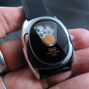 Q&Q By Citizen Jumping Hours Quartz Unisex Watch - Picture 1 of 8