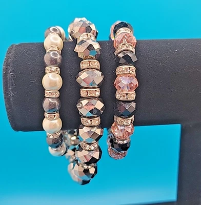 Lote 3 Pulseras Elásticas Gris Plateado, Perla, Rosa y Estrás Foto 1 de 4