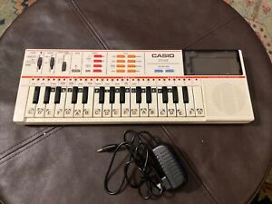 Vintage Casio PT-82 32 Key Electronic Keyboard TESTED working With AC Adapter