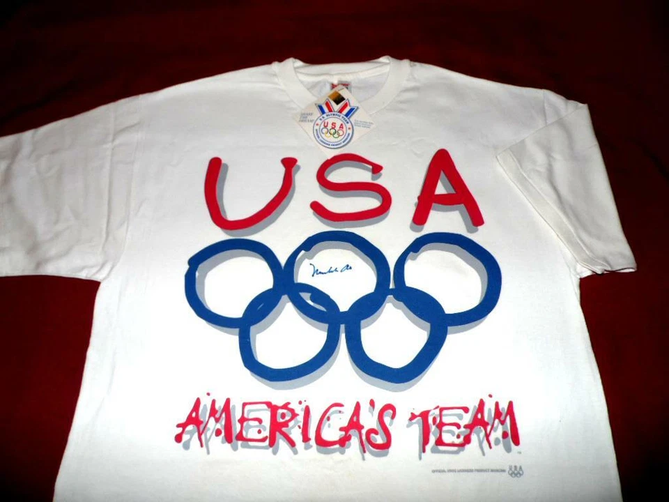 MUHAMMAD ALI 1996 U.S.A. OLYMPIC AUTOGRAPHED TEAM USA RED, WHITE AND BLUE SHIRT - Image 1 of 4