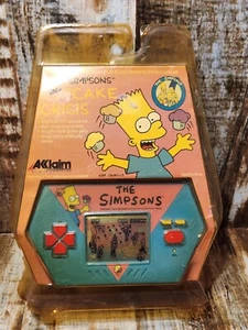 Videojuego electrónico portátil Bart Simpsons Cupcake Crisis de AKKLAIM 1989 NUEVO - Imagen 1 de 6