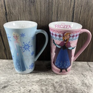 Lot of 2 FROZEN ANNA & ELSA Disney Store 6" Tall Ceramic Coffee Tea Cup Mug Set - Picture 1 of 5