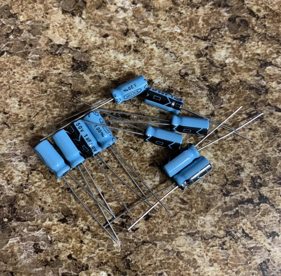 Condensador Radial Xicon 1uF 50V 20% (10 piezas = 1 lote) Foto 1 de 1