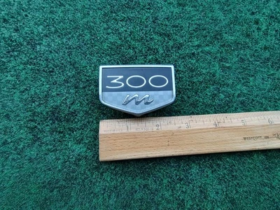 Chrysler 300 M 1999-2004 emblema logotipo símbolo insignia guardabarros cromo 04805287AD 8L9 Foto 1 de 4