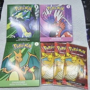 3 Pokemon McDonald's Happy Meal Miraidon Koraidon Charizard w/ TCG card 2024-25 - Picture 1 of 2
