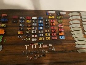 Vintage Micro Machines over 60 Mini Cars, Monster Trucks, Planes, and road.