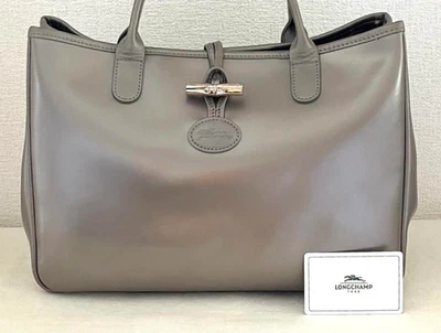 Auténtico bolso de mano Longchamp Roseau Toggle de cuero gris plateado con logotipo en relieve para A4 Foto 1 de 4