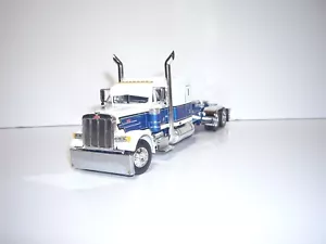 DCP FIRST GEAR 1/64 BLUE AND WHITE PETERBILT 379 WITH 63" SLEEPER - Picture 1 of 5