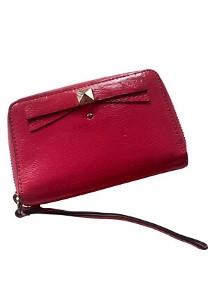 Cartera plegable Kate Spade Stacy Montford Park charol rosa intenso con lazo Foto 1 de 4