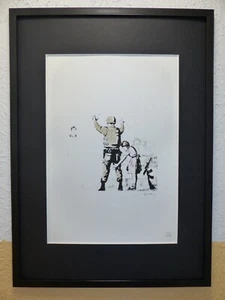 BANKSY Lithografie 50 x 35 cm"Girl frisking soldier" signiert, limit. u"GERAHMT" - Picture 1 of 6
