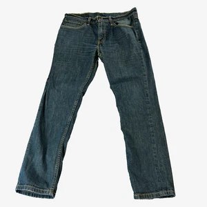 Pantalones de mezclilla Levi's 511 para hombre 32 28 * calce cónico azul lavado oscuro bigotes elásticos - Imagen 1 de 12