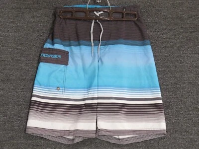 Pantalones cortos de natación Zeroxposur Board Shorts para niños medianos azules negros Foto 1 de 3