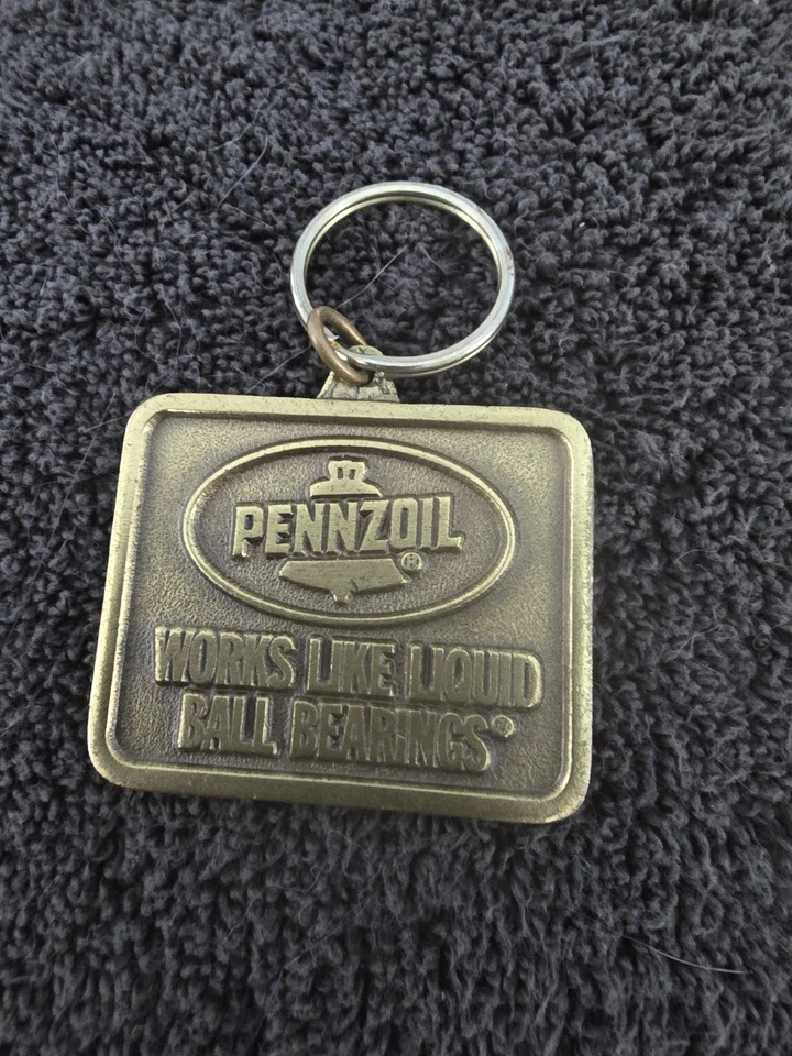 Винтажный клубный брелок Pennzoil 100 000 миль - Изображение 1 из 3