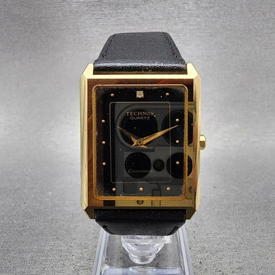 Reloj Technos Camargue Tank Hombre 26mm Esfera Negra Tono Dorado Rectángulo Nuevo Batt Foto 1 de 4